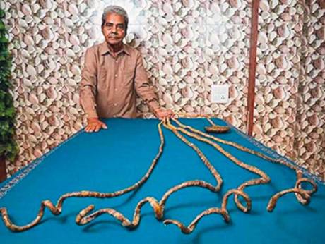 Watch Guinness World Record Holder of Longest Nails Cut Them the First Time in 66 Years